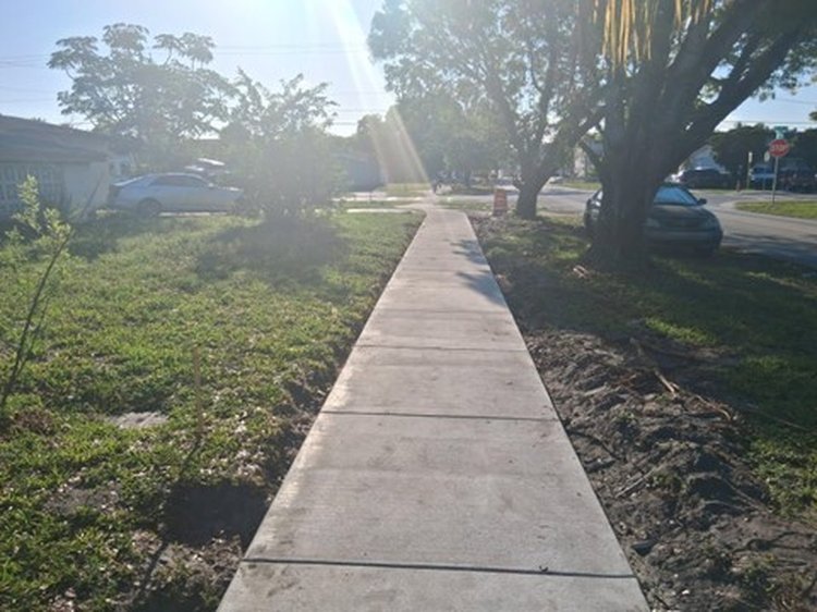 installation of new five foot wide concrete sidewalk along NW 19th Street May 2025