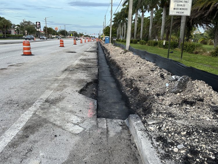 Curb and Gutter Curb Pad Installed on the North Side of Forest Hill Blvd. East of Erie Terrace   September 2024