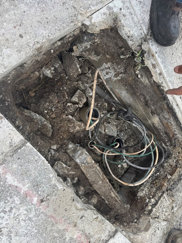 Removed concrete and installed cabling for lighting a   April 2025