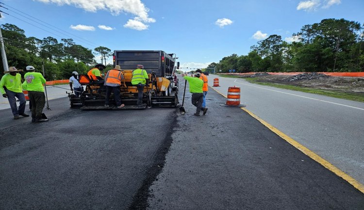 Placing temporary special detour asphalt median looking east, June 2024