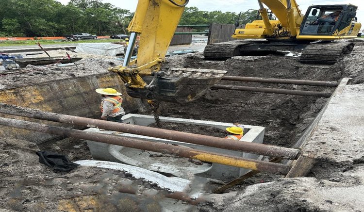 Installing structure S 221 and 38'' X 60'' pipe, Midway Road, north side, west of Selvitz Road, August 2024