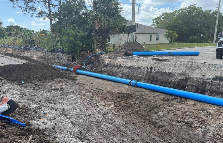 Watermain installation across Milner Drive, May 2025